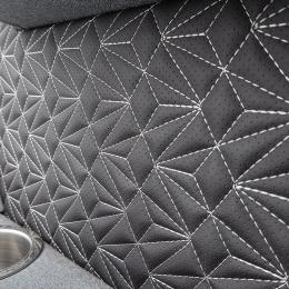 Plush seating and refined interior aesthetics aboard the Alera Model M 23Q tritoon.