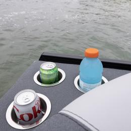 Rear cupholders at the stern of the Alera Model M 23Q keep refreshments secure and accessible — the perfect finishing touch to every social cruise.