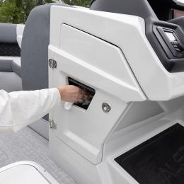 Innovative helm riser with integrated trash can keeps your deck clean and organized — a discreet convenience built into every Alera Model M 23Q.