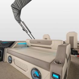 Luxurious forward-facing lounger on the Alera Model M 25L — classic bench seating reimagined with plush cushioning and premium marine-grade vinyl.