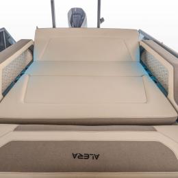 Forward-facing lounge position on the Alera Model M25L — designed for comfort, conversation, and uninterrupted lake views.